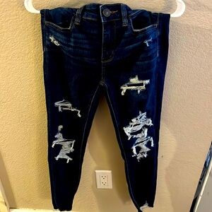 American Eagle distressed dark denim jeans